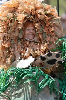 Cleveland, Ohio, USA - June 8, 2019: Parade the Circle, Woman wearing an abstract lion outfit