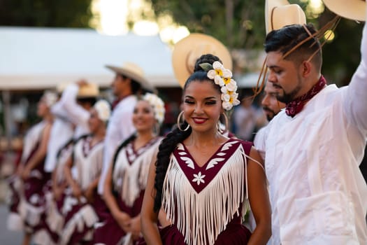 Matamoros, Tamaulipas, Mexico - June 30, 2019:  Kermes Cathedral Nuestra Senora del Refugio, Men and women in traditional clothing, performing traditional dances during a Church Festival in the streets of Matamoros