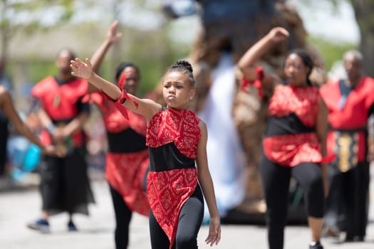 Cleveland, Ohio, USA - June 8, 2019: Parade the Circle, african american women and children wearing african style clothing dancing