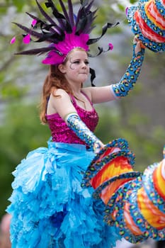 Cleveland, Ohio, USA - June 8, 2019: Parade the Circle, women on stilts dancing during the parade