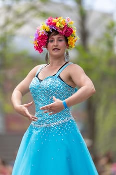 Cleveland, Ohio, USA - June 8, 2019: Parade the Circle, women on stilts dancing during the parade