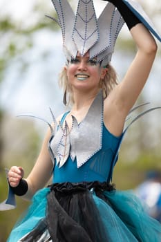 Cleveland, Ohio, USA - June 8, 2019: Parade the Circle, women on stilts dancing during the parade
