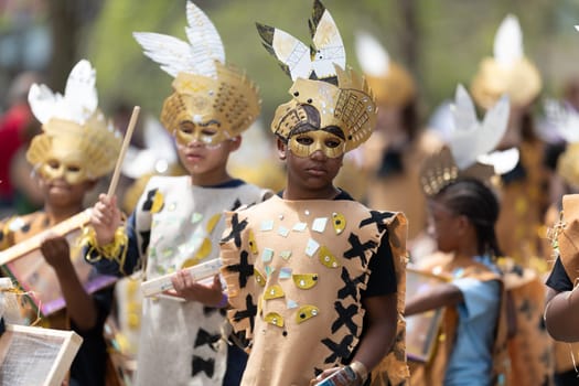 Cleveland, Ohio, USA - June 8, 2019: Parade the Circle, children wearing african style clothing playing the drums