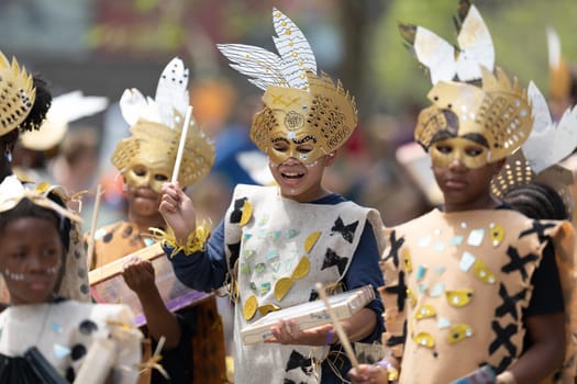 Cleveland, Ohio, USA - June 8, 2019: Parade the Circle, children wearing african style clothing playing the drums