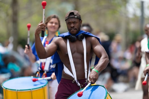 Cleveland, Ohio, USA - June 8, 2019: Parade the Circle, African American man playing the drums during the parade