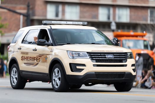 Louisville, Kentucky, USA - May 2, 2019: The Pegasus Parade, a Jefferson County Sheriff patrol unit driving down the street during the parade