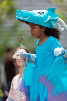 Cleveland, Ohio, USA - June 8, 2019: Parade the Circle, people wearing colorful abstract outfits during the parade