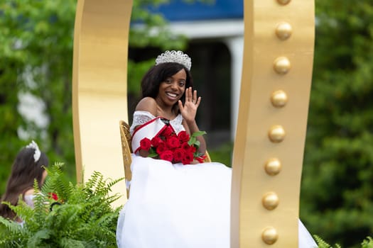 Louisville, Kentucky, USA - May 2, 2019: The Pegasus Parade, Float carrying the Kentucky Derby Royal Court during the parade