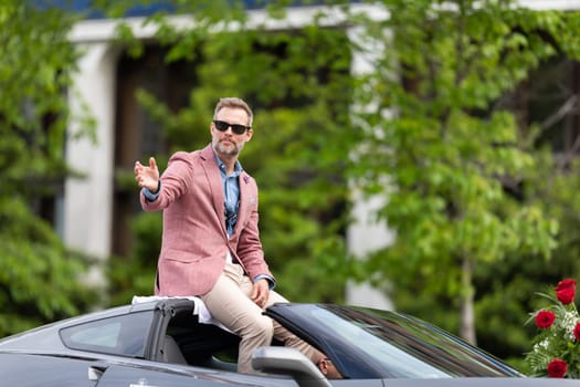 Louisville, Kentucky, USA - May 2, 2019: The Pegasus Parade, Car transporting Travis Schuldt, Actor, during the parade