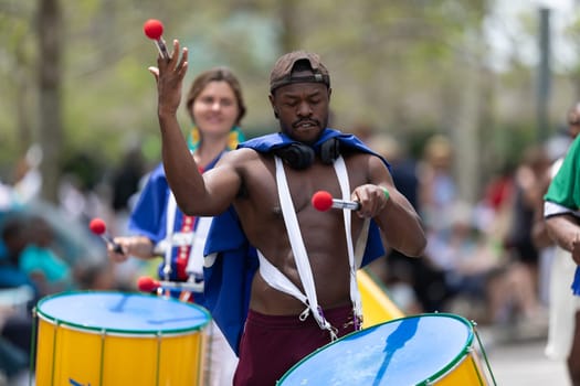 Cleveland, Ohio, USA - June 8, 2019: Parade the Circle, African American man playing the drums during the parade