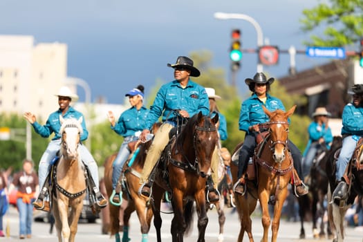 Louisville, Kentucky, USA - May 2, 2019: The Pegasus Parade, Members of the KY Hardriders, on horses going down the street during the parade