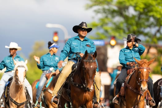 Louisville, Kentucky, USA - May 2, 2019: The Pegasus Parade, Members of the KY Hardriders, on horses going down the street during the parade