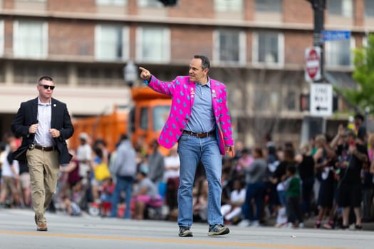 Louisville, Kentucky, USA - May 2, 2019: The Pegasus Parade, Governor of the State of Kentucky, United States, waklking down the street during the parade
