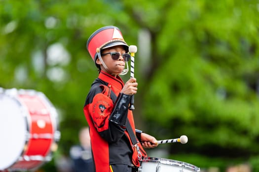 Louisville, Kentucky, USA - May 2, 2019: The Pegasus Parade, Members of the River City Drum Corp performing at the parade