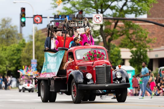 Louisville, Kentucky, USA - May 2, 2019: The Pegasus Parade, Classic Turck carrying two hot air balloon baskets, shooting flames during the parade