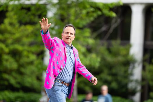 Louisville, Kentucky, USA - May 2, 2019: The Pegasus Parade, Governor of the State of Kentucky, United States, waklking down the street during the parade