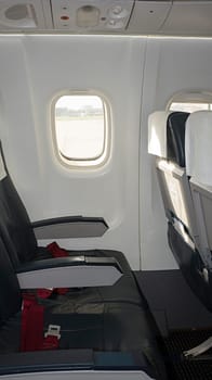 airplane seat indoor empty row window travel