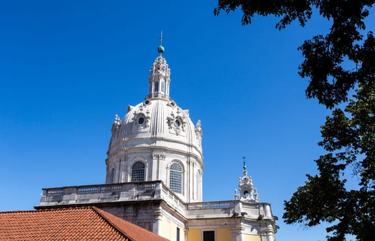 Dome of the late Baroque and Neo-Classical Royal Basilica and Convent of the Most Sacred Heart of Jesus, built in late 18th century in Lisbon, Portugal