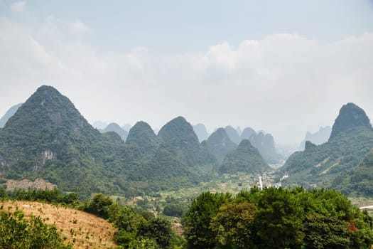 View of the picturesque mountainous terrain, Scenic Mountain View, Yangshuo, China, Asia