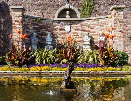 Gardens of the Powerscourt estate, pond with fountain, Wicklow, Ireland