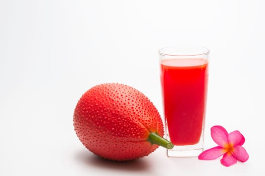 Baby Jackfruit, Gac fruit with baby jackfruit juice isolated on white background. Drink and healthy concept.