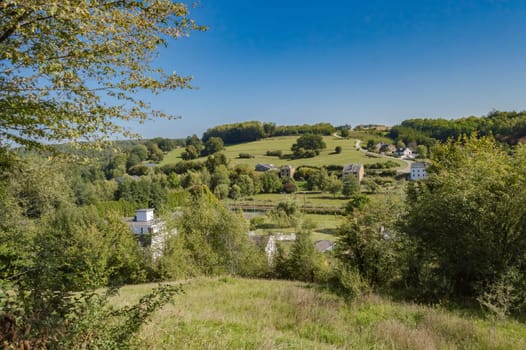 View of a hill in a meadow of the gaume in Meix in front of Virton near Virton in Belgium