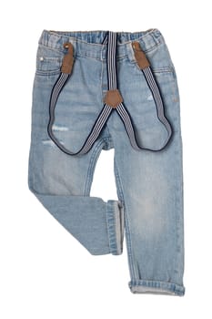 Jeans isolated. Trendy stylish blue denim pant or trousers for child boy with striped suspenders isolated on a white background. Jeans summer and autumn fashion. Back view.