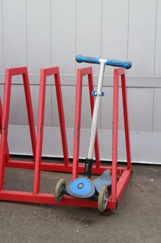 children's scooter in the parking lot