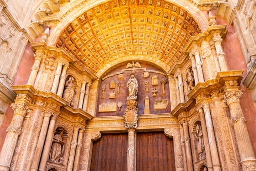 Palma Mallorca Spain June 2015 Beautiful gothic style entrance to Cathedral of Santa Maria of Palma La Seu splendour and craftsmanship in architecture