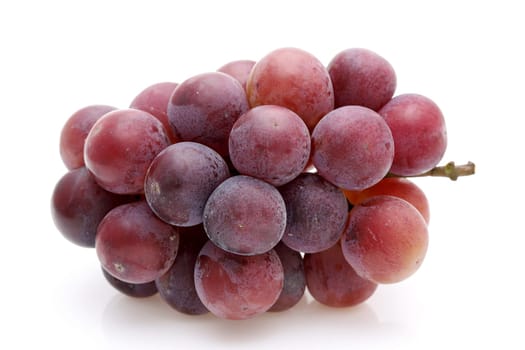 bunch of ripe red grapes isolated on white background
