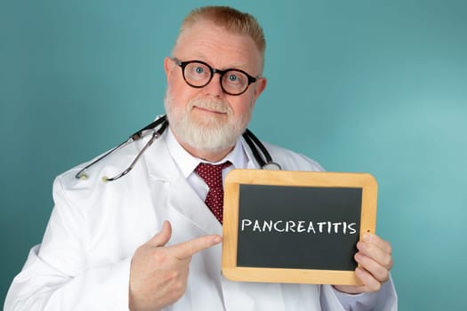 Doctor with eyeglasses holding blank chalkboard on blue background