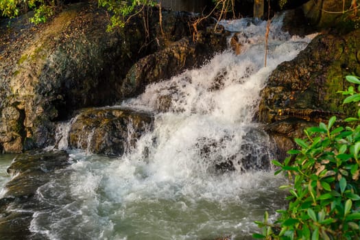 Streams of water from a rocky hill, mountain stream