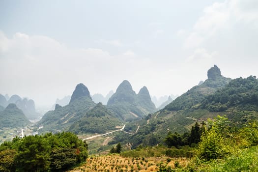 View of the picturesque mountainous terrain, Scenic Mountain View, Yangshuo, China, Asia