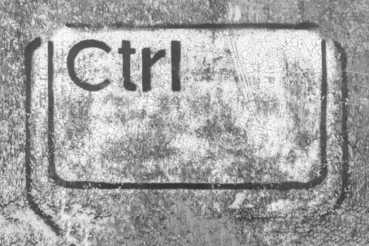 Grunge graffiti depicting the Ctrl key. Ideal for creative backgrounds computer-based concepts. IT piracy. Deep web. Hackers