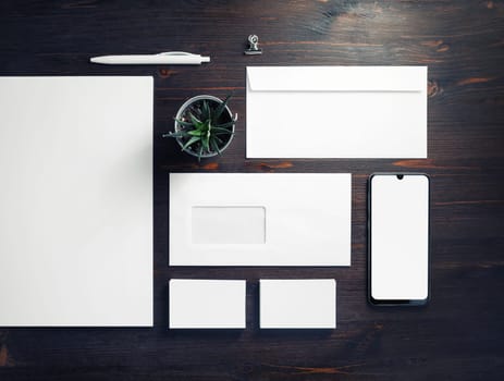 Corporate identity template. Blank stationery mock up on wooden background. Flat lay.