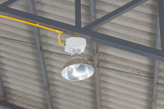 fluorescent lamp on the modern ceiling of factory