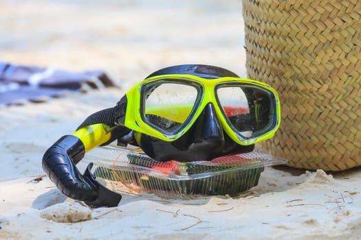 close up snorkel and scuba mask on the beach