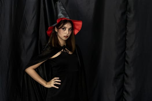Portrait of teenager young adult girl in Halloween costume for Halloween party background