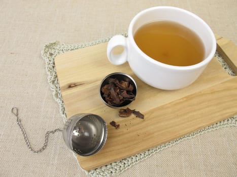 Cup of cacao husk tea from the roastet outer shells of the cacao bean