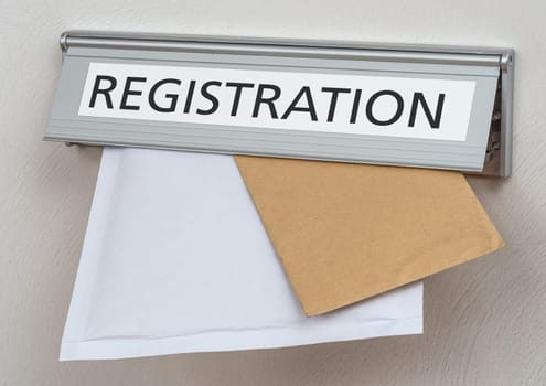 A letterbox with the label Registration