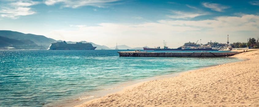 Scenic view of Nha Trang beach at sunny day. Beautiful tropical landscape. High resolution panorama