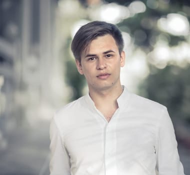 Outdoor portrait of a handsome young man