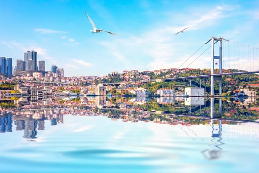 The Bosphorus bridge, the Ortakoy Mosque and the skyscrappers on the background, Istanbul.