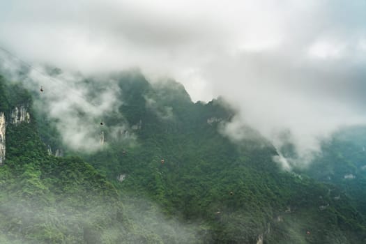 Asia longest cable car going to the top of the famous Heaven Linking Avenue or Big Gate Road Tianmen mountains, Zhangjiajie, China