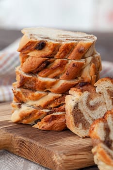 Homemade braided cake with a nuts and almonds filling