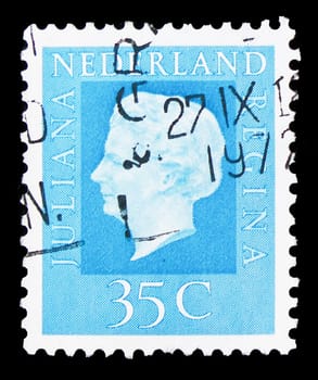 MOSCOW, RUSSIA - AUGUST 8, 2019: Postage stamp printed in Netherlands shows Queen Juliana (1909-2004), Type 'Regina' serie, circa 1972