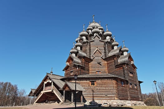 April  11, 2018 St. Petersburg, Russia, old wooden church low angle view, wooden architecture Russian north