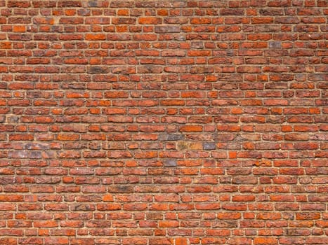 Red brick wall background texture. Background of old vintage red brick wall. Grunge red brick wall background with copy space. Old Brick Wall Background. Design template with place for text.