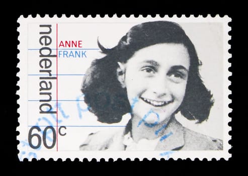MOSCOW, RUSSIA - MAY 13, 2018: A stamp printed in Netherlands shows Family portrait of Anne Frank, Occupation and liberation serie, circa 1980