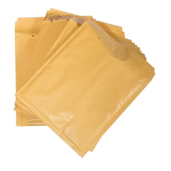 Stack of padded mailing envelopes isolated against a white background